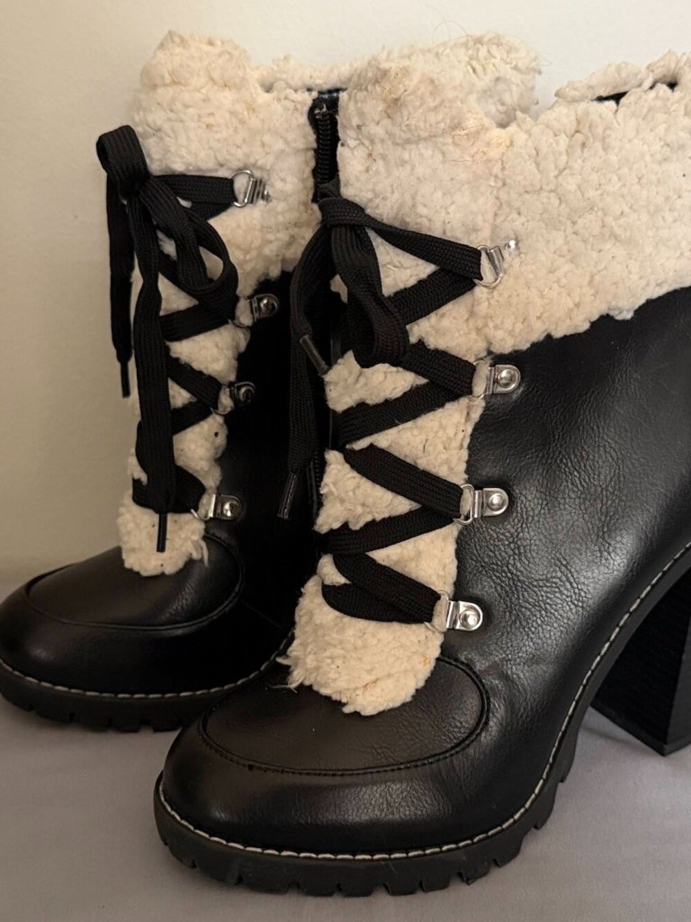 Black leather lace-up platform boots from BCBGeneration, fur trim size 8